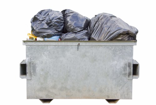 Waste clearance truck parked in Rayners Lane street