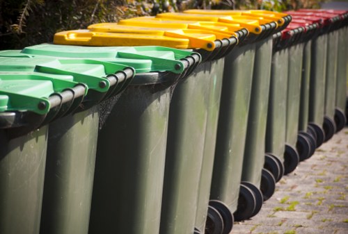 Professionals clearing waste in Canonbury