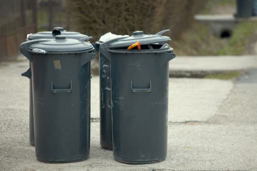 Modern waste collection and recycling trucks in Rotherhithe