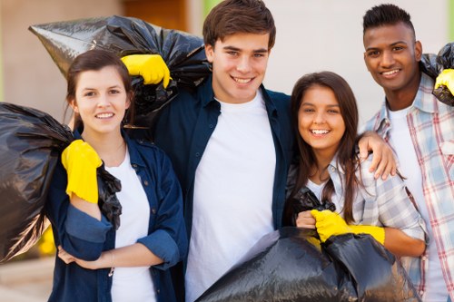 Local workers disposing of recycled waste in Coombe