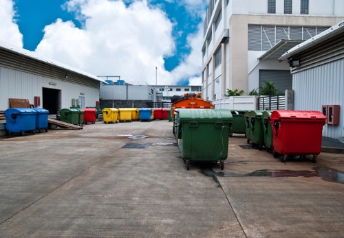 Residential waste clearance team working together