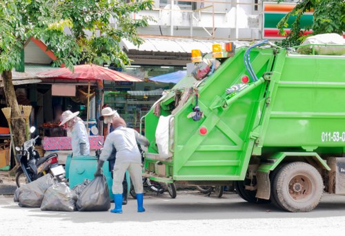 Modern waste removal process in Gipsy Hill with organized debris