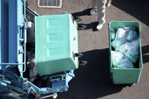 Waste management workers sorting recyclable materials in Balham