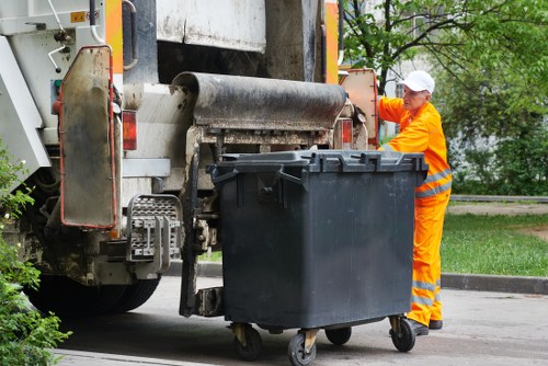 Modern waste management truck collecting recyclables