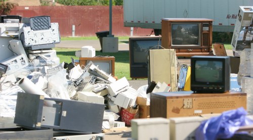 Residential waste clearance with organized bins in Wallington neighborhood