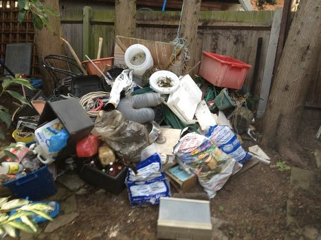 Modern waste disposal truck on city streets in West Harrow