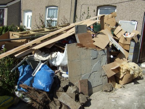 Community workers collecting waste in Limehouse streets