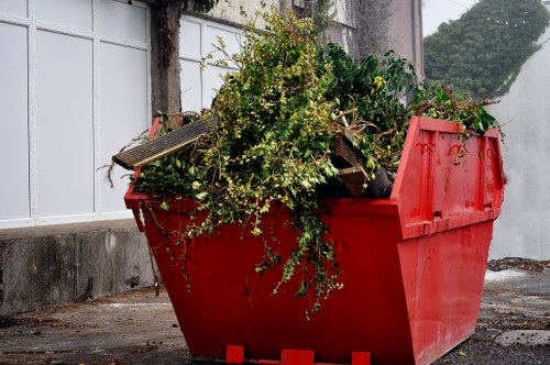 Efficient waste clearance vehicles and staff in action