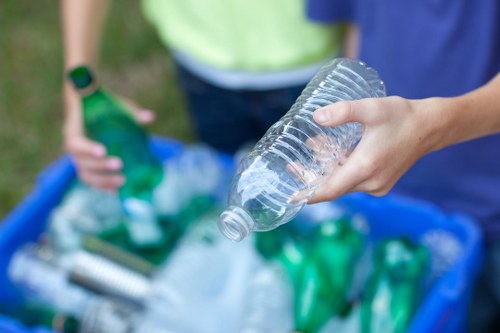 Image of workers sorting and recycling waste materials