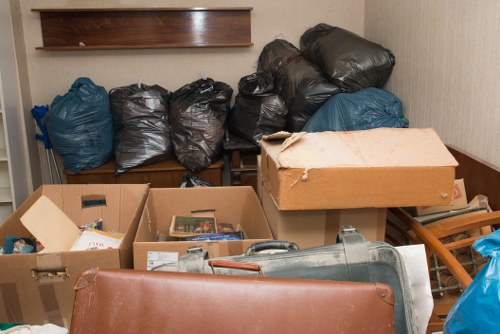 Professional team managing waste removal in West Heath